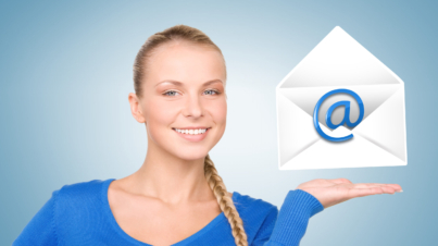 picture of smiling woman showing virtual envelope